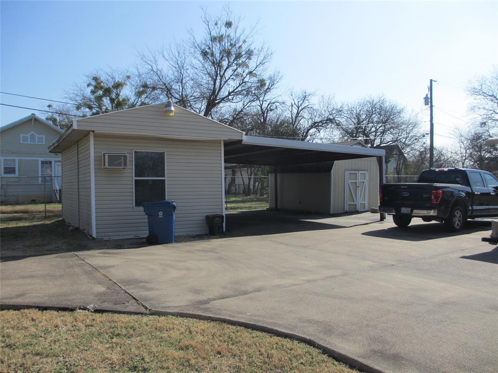 608 North Colorado Street Whitney, TX 76692 - Photo 7 of 27 a view of a car park in front of house