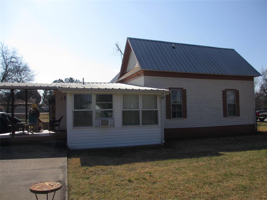 608 North Colorado Street Whitney, TX 76692 - Photo 8 of 27 a house view with a garden space