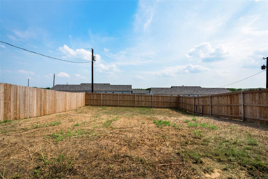 109 James Street, Unit 200 Decatur, TX 76234 - Photo 19 of 21 a view of a backyard