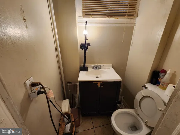 a kitchen with a stove and a refrigerator