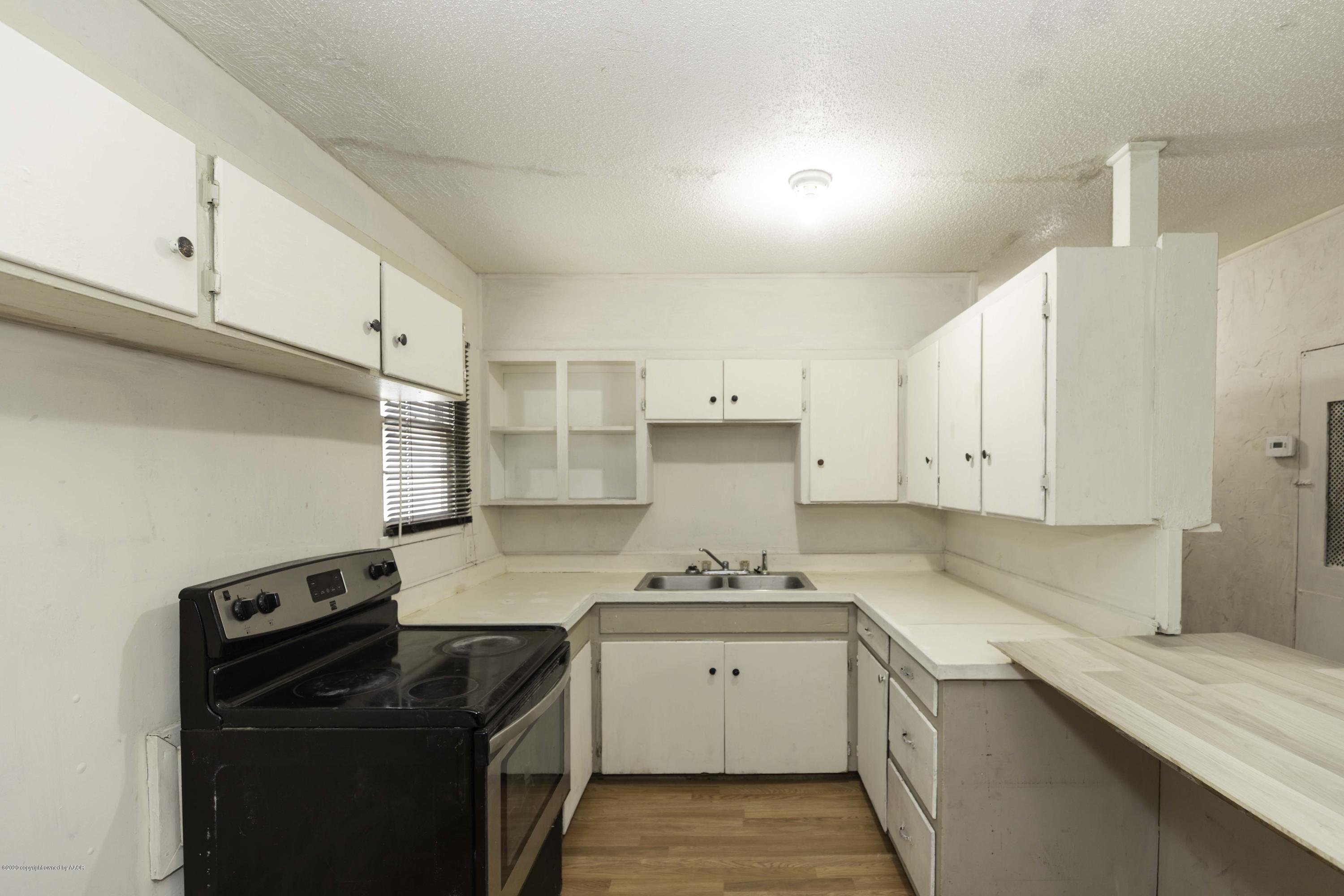5003 Bowie Street Amarillo, TX 79110 - Photo 6 of 25 KITCHEN VIEW 1