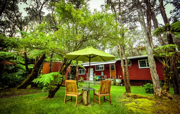 a view of backyard with seating and green space