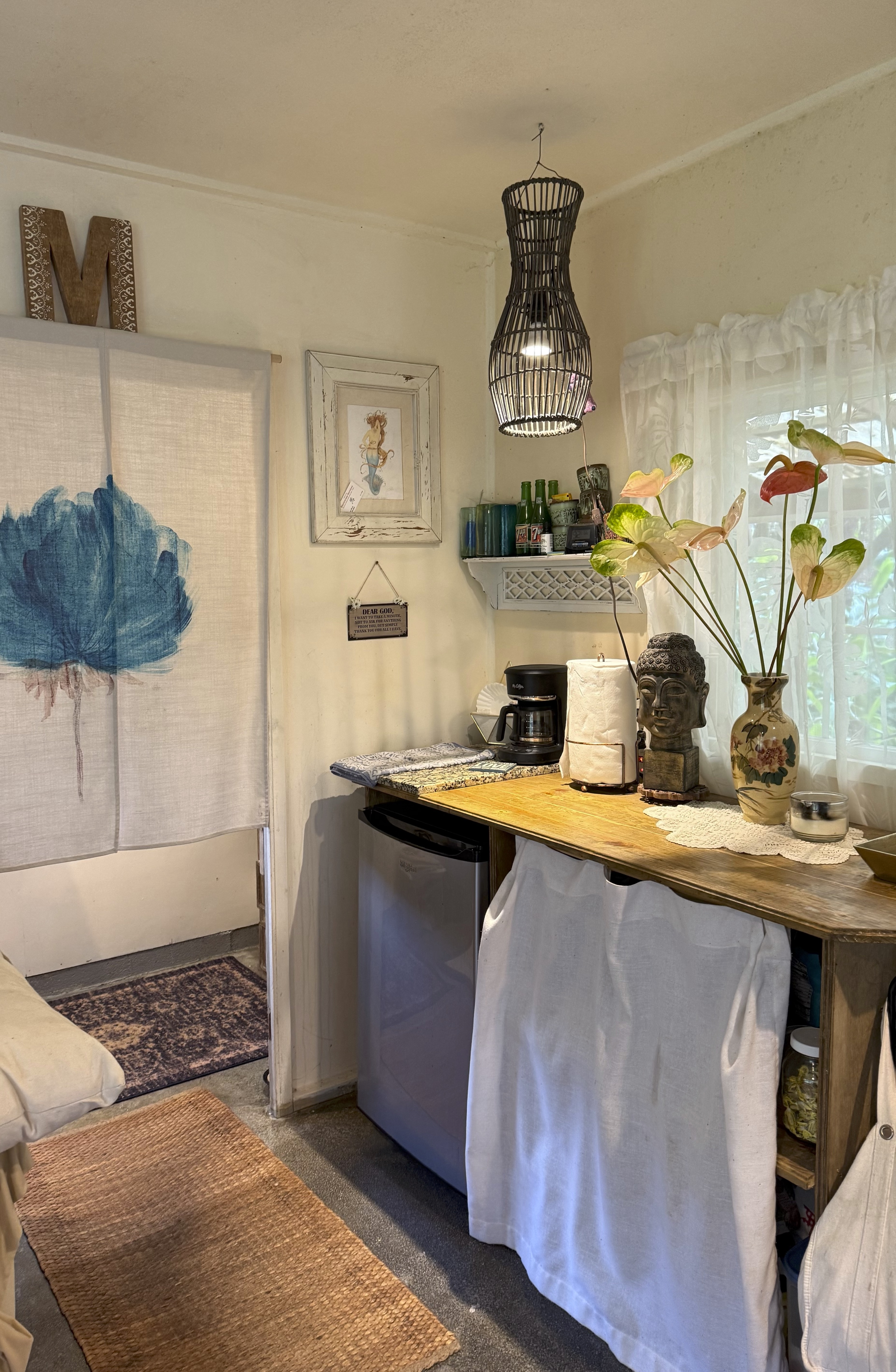 11-3972 Lanihuli Road Volcano, HI 96785 - Photo 18 of 21 a kitchen with stainless steel appliances granite countertop a sink a stove and a wooden cabinets