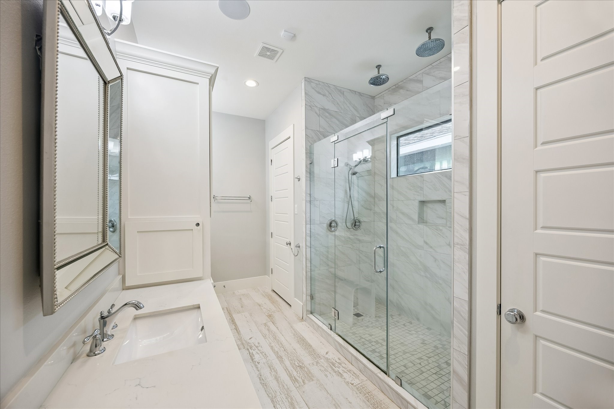 1519 Richelieu Lane Houston, TX 77018 - Photo 13 of 30 Primary bath has two sinks and a tiled shower with seamless glass