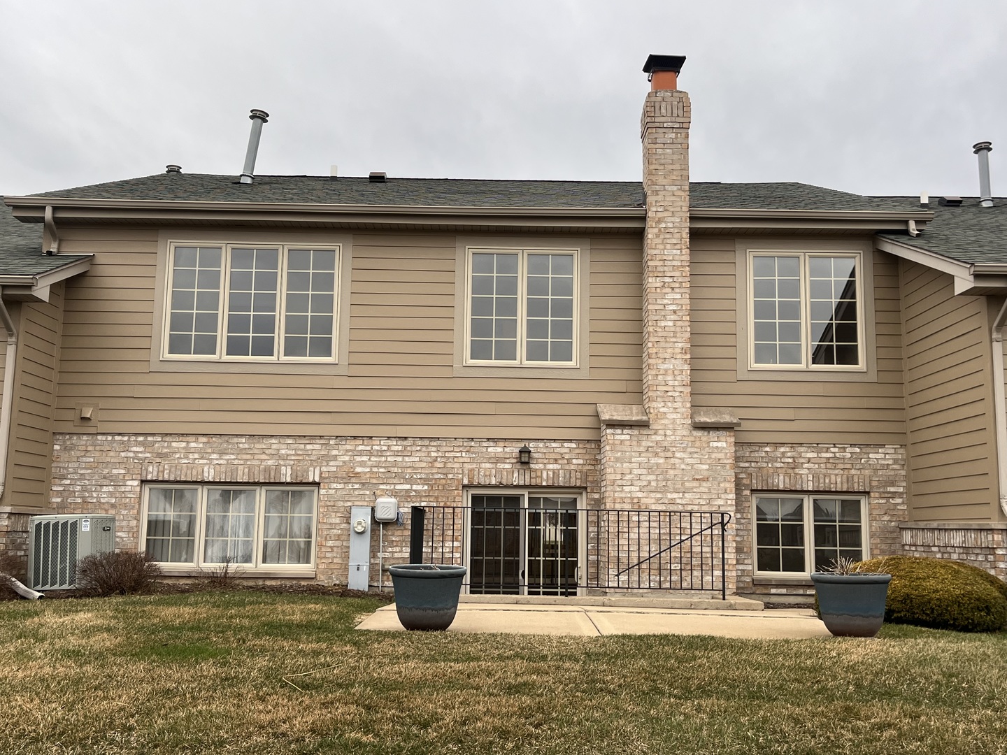 402 Chestnut Lane Beecher, IL 60401 - Photo 22 of 23 a front view of a house with a yard