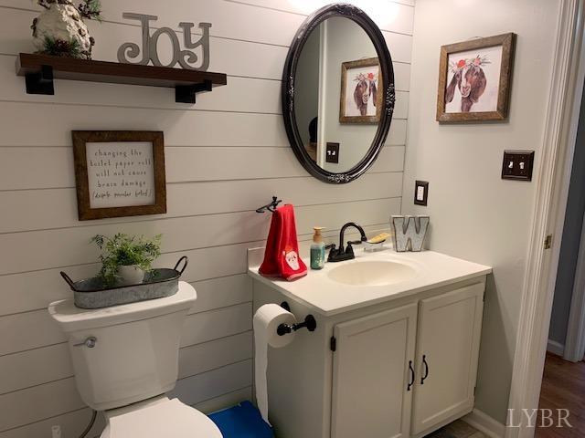 203 Kimball Road Concord, VA 24538 - Photo 13 of 27 a bathroom with a toilet sink vanity and mirror