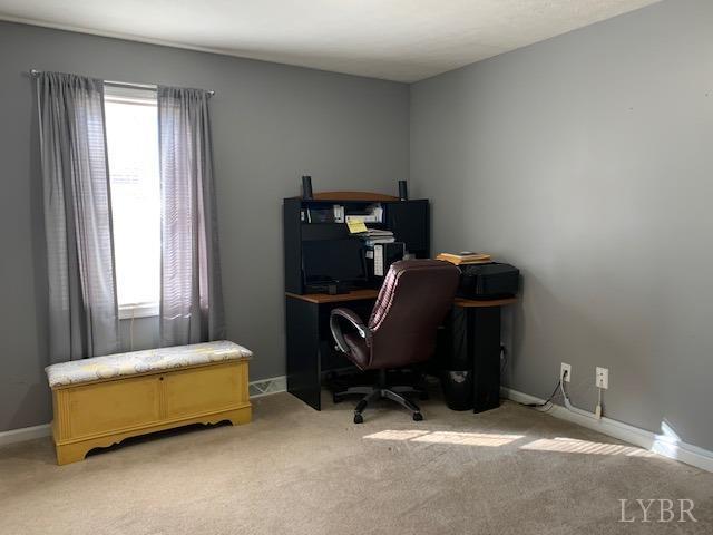 203 Kimball Road Concord, VA 24538 - Photo 14 of 27 a bedroom with bed and a window