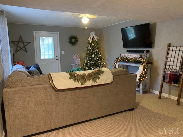 203 Kimball Road Concord, VA 24538 - Photo 17 of 27 a living room with furniture and a flat screen tv
