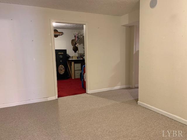 203 Kimball Road Concord, VA 24538 - Photo 19 of 27 a view of a livingroom and a empty room with furniture
