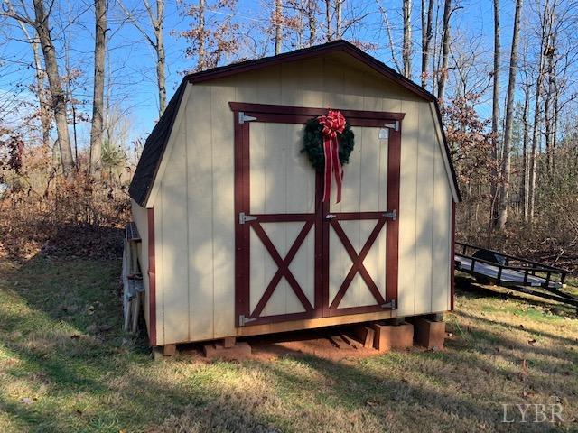 203 Kimball Road Concord, VA 24538 - Photo 21 of 27 a front view of a house with garden