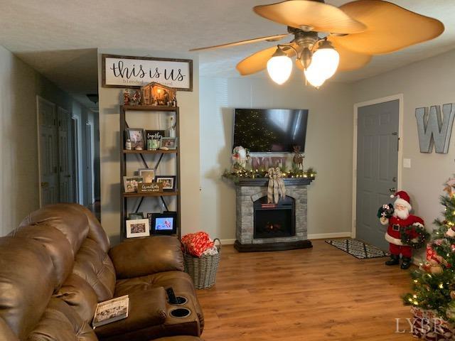 203 Kimball Road Concord, VA 24538 - Photo 3 of 27 a living room with furniture and a flat screen tv