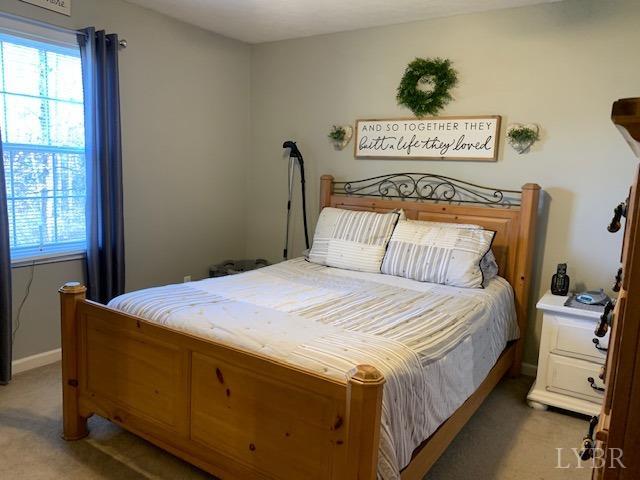 203 Kimball Road Concord, VA 24538 - Photo 9 of 27 a bedroom with a bed and window