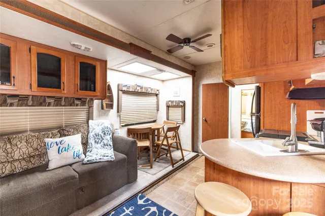 a living room with furniture and a table