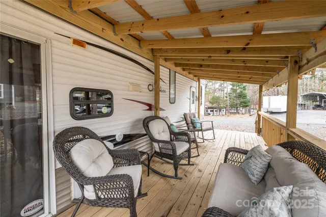 a view of a balcony with a potted plant