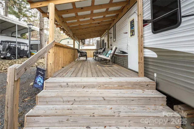 a view of a swimming pool with an outdoor seating
