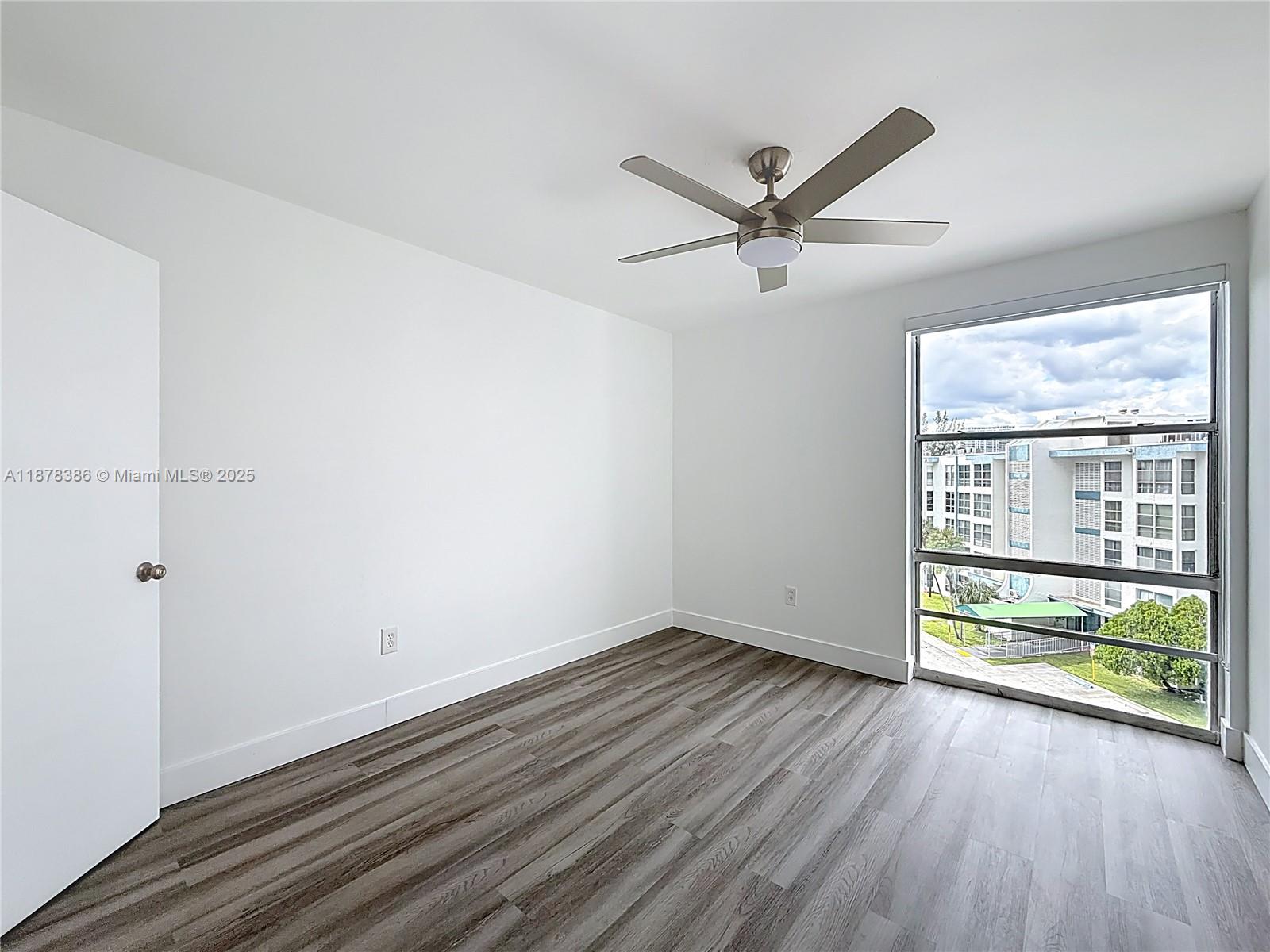 17620 Atlantic Boulevard, Unit 505 Sunny Isles Beach, FL 33160 - Photo 22 of 35 wooden floor in an empty room