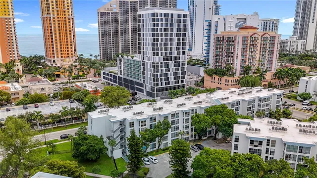 a view of city with tall buildings