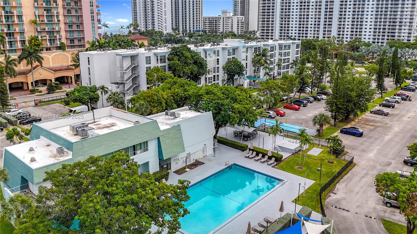17620 Atlantic Boulevard, Unit 505 Sunny Isles Beach, FL 33160 - Photo 35 of 35 an aerial view of a house with a garden and plants