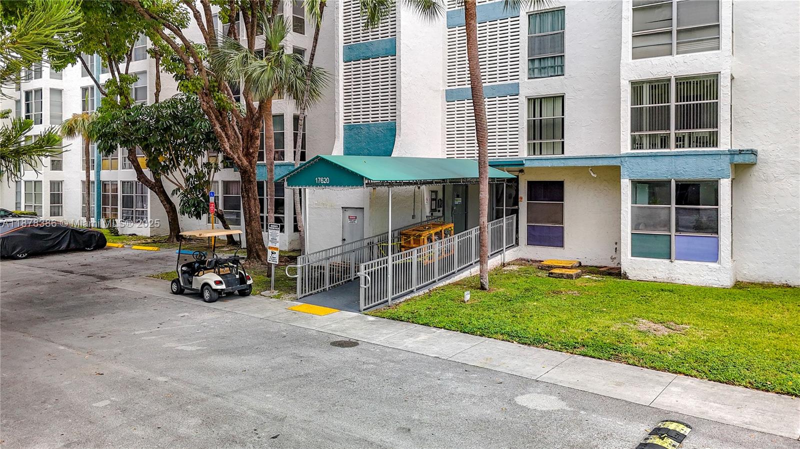 17620 Atlantic Boulevard, Unit 505 Sunny Isles Beach, FL 33160 - Photo 7 of 35 a view of a house with backyard and porch