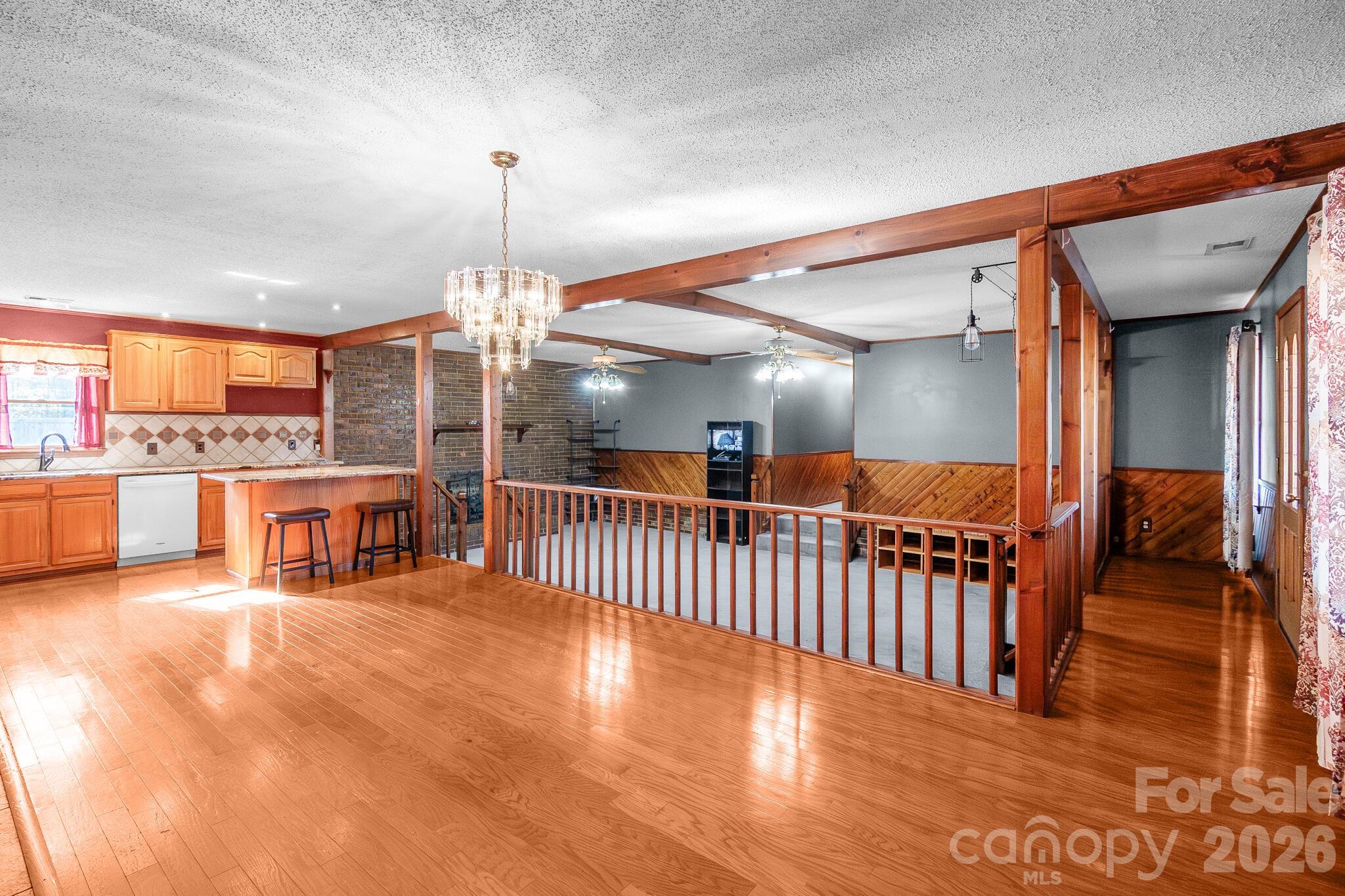 1295 Cattle Ridge Road Cheraw, SC 29520 - Photo 18 of 21 a view of a living room and chandelier in a room