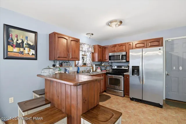 a view of a room with a fan
