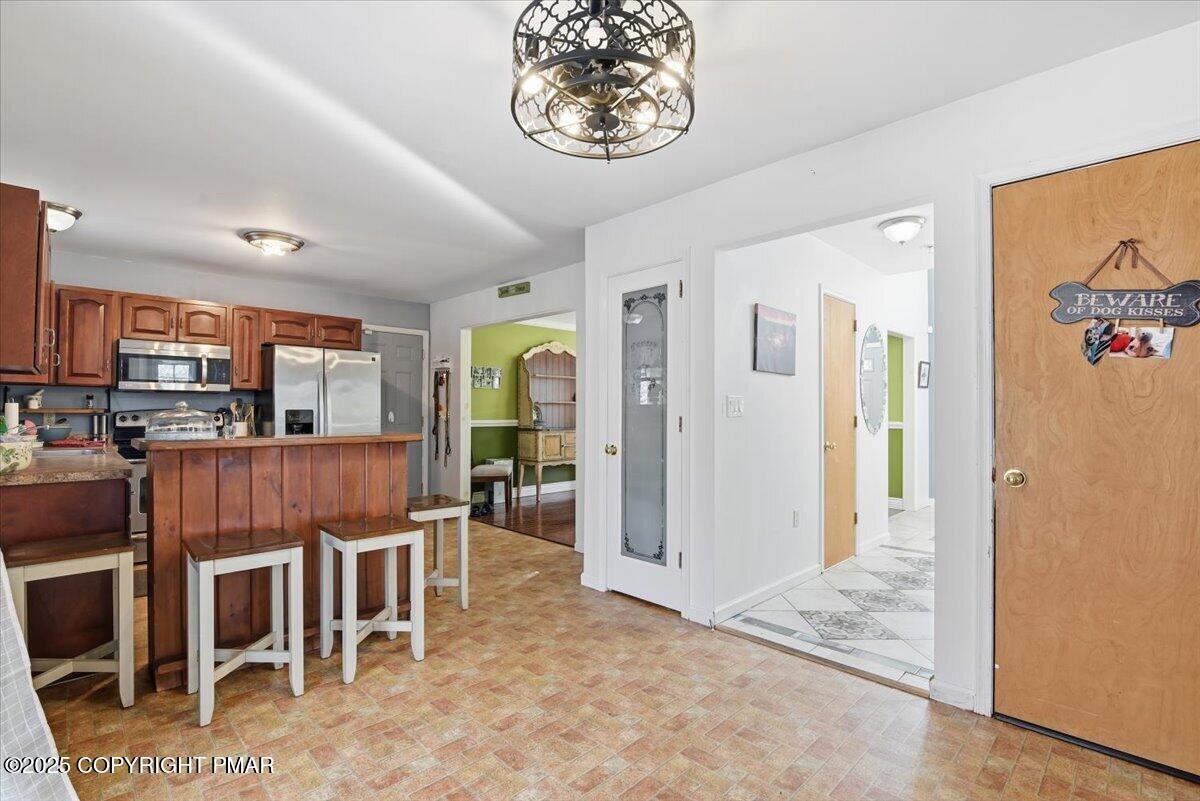106 Ashley Court Bushkill, PA 18324 - Photo 17 of 61 a view of a dining room with furniture