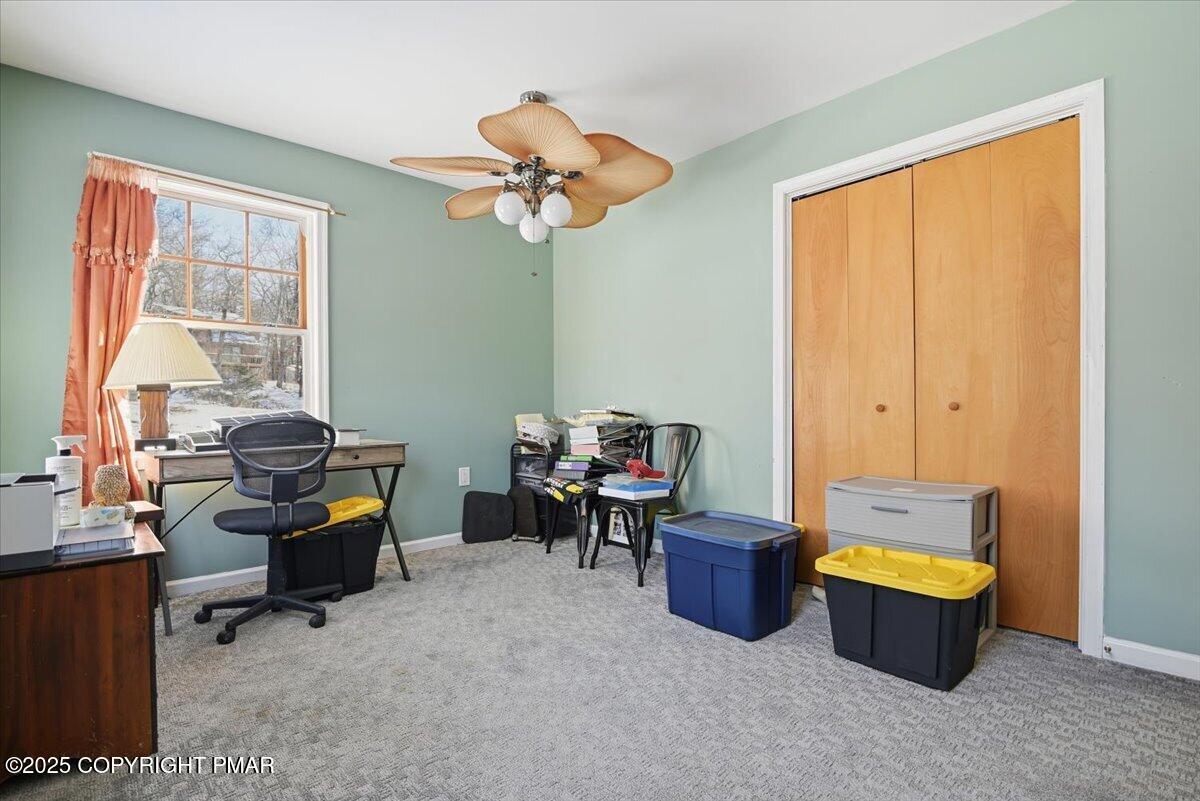106 Ashley Court Bushkill, PA 18324 - Photo 27 of 61 a living room with furniture and a window