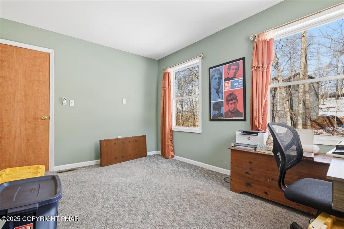 106 Ashley Court Bushkill, PA 18324 - Photo 28 of 61 a bedroom with furniture and a window