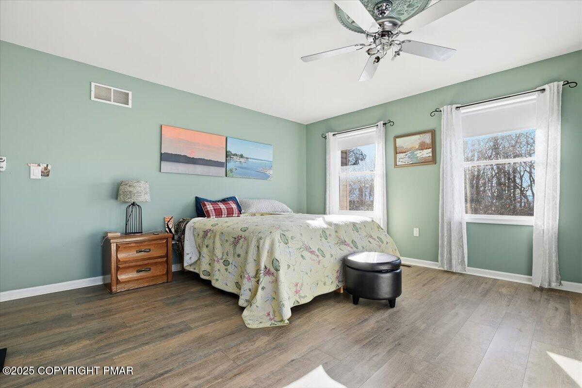 106 Ashley Court Bushkill, PA 18324 - Photo 30 of 61 a bedroom with a bed and a window