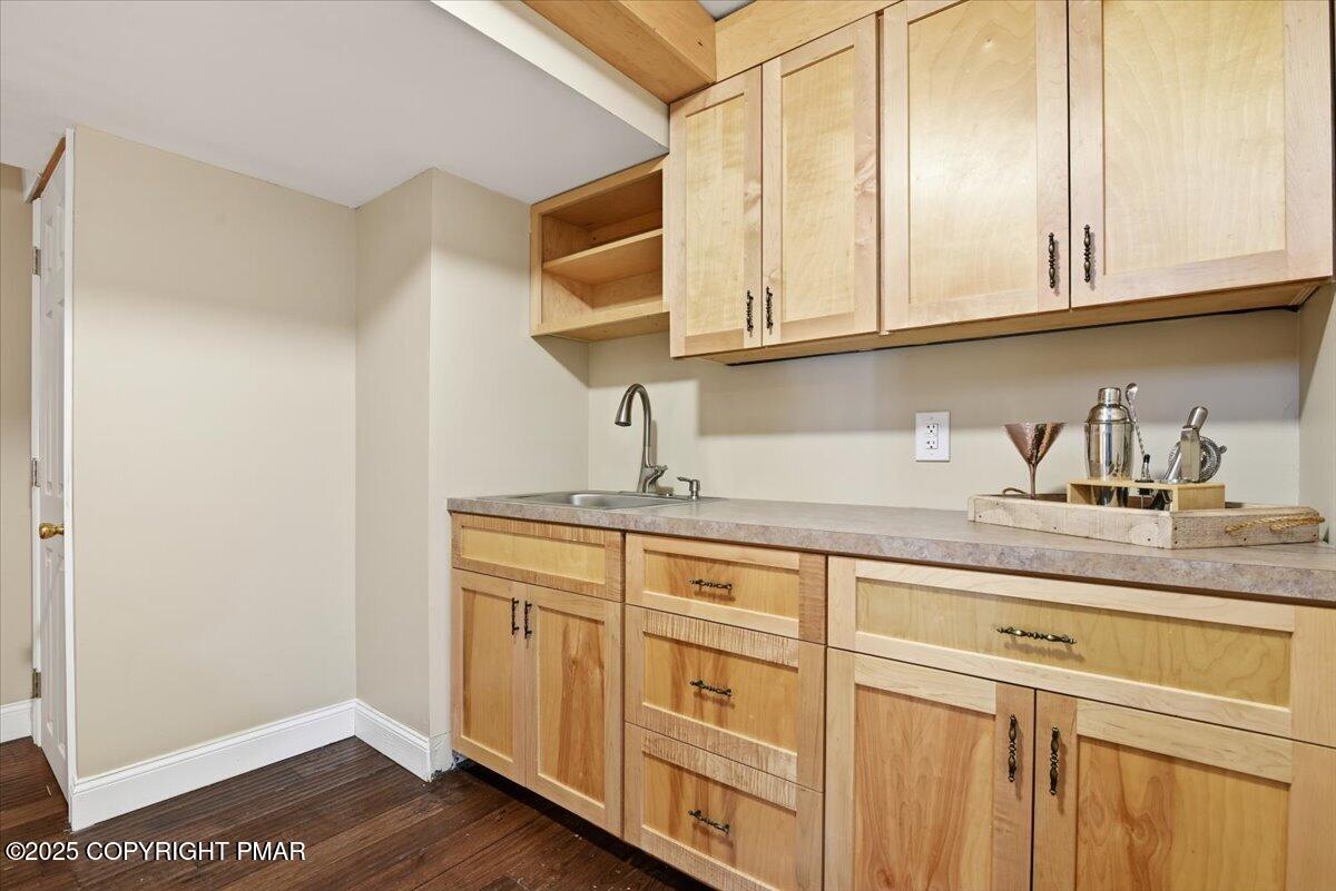 106 Ashley Court Bushkill, PA 18324 - Photo 42 of 61 a kitchen with granite countertop white cabinets and a sink