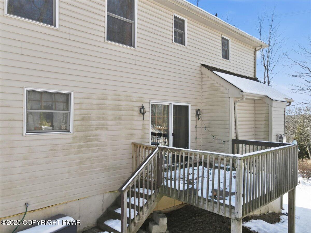 106 Ashley Court Bushkill, PA 18324 - Photo 53 of 61 a view of a house with wooden deck