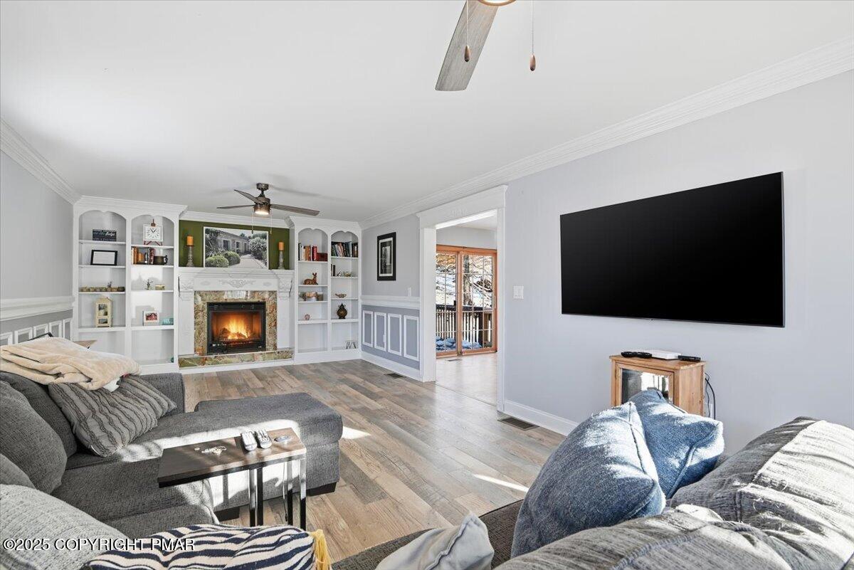 106 Ashley Court Bushkill, PA 18324 - Photo 7 of 61 a living room with furniture and a flat screen tv
