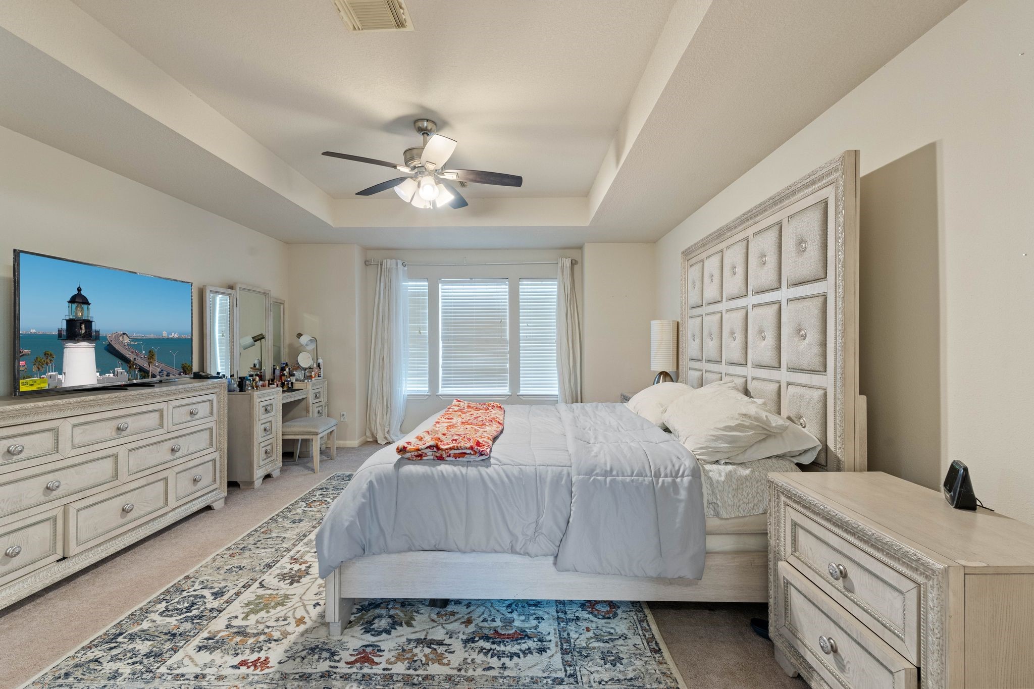 1908 Northampton Drive Conroe, TX 77303 - Photo 20 of 44 a bed room with a bed and a window