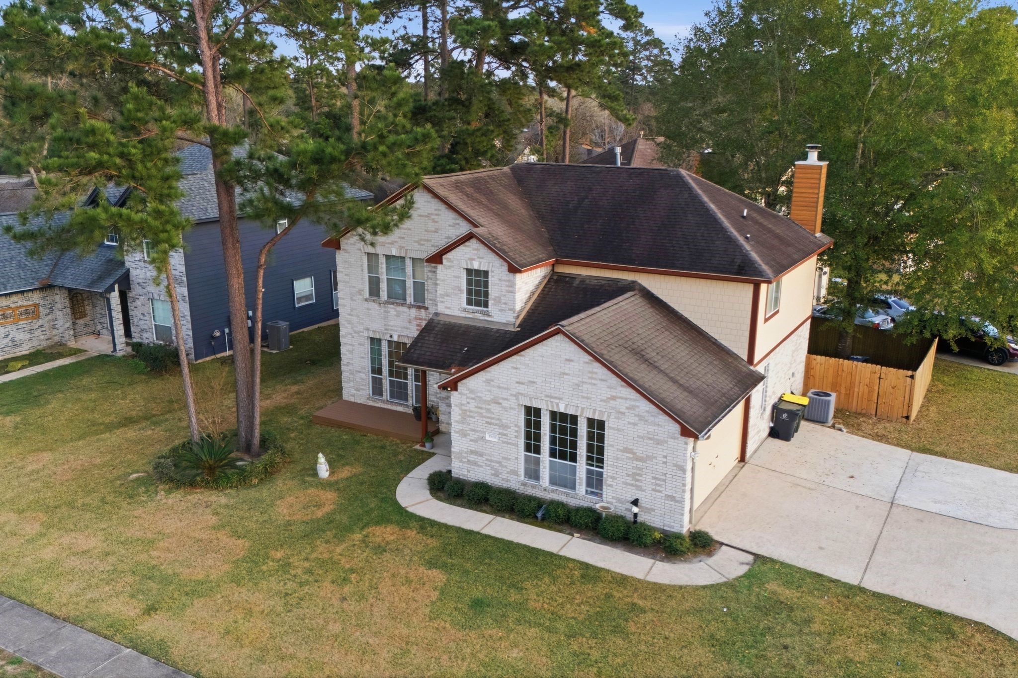 1908 Northampton Drive Conroe, TX 77303 - Photo 2 of 44 a view of a house with a yard