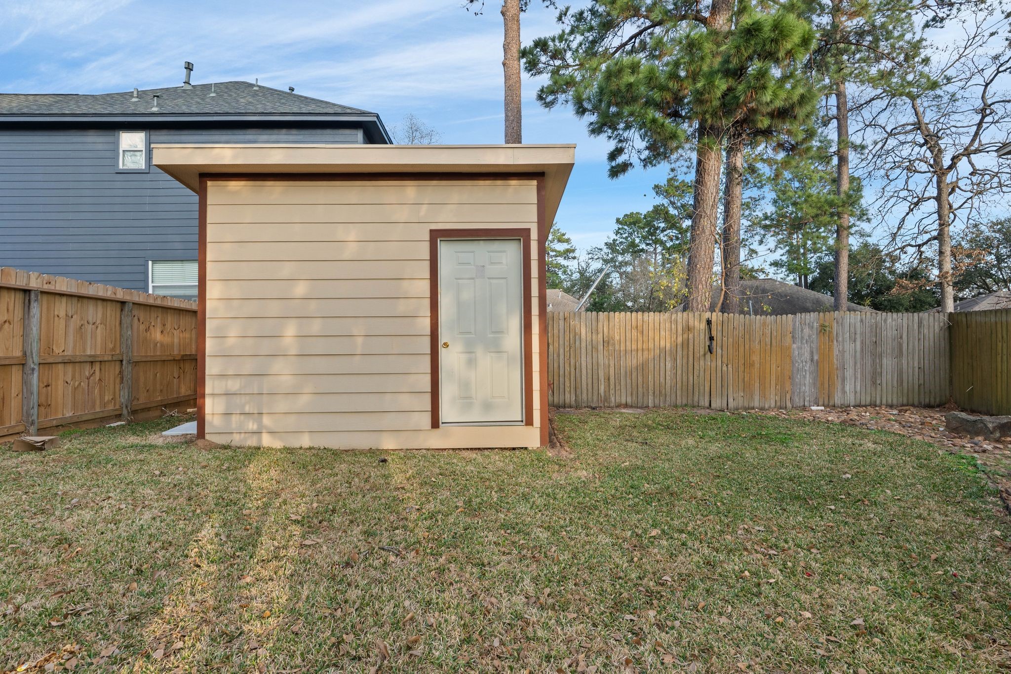 1908 Northampton Drive Conroe, TX 77303 - Photo 36 of 44 a view of a backyard of the house