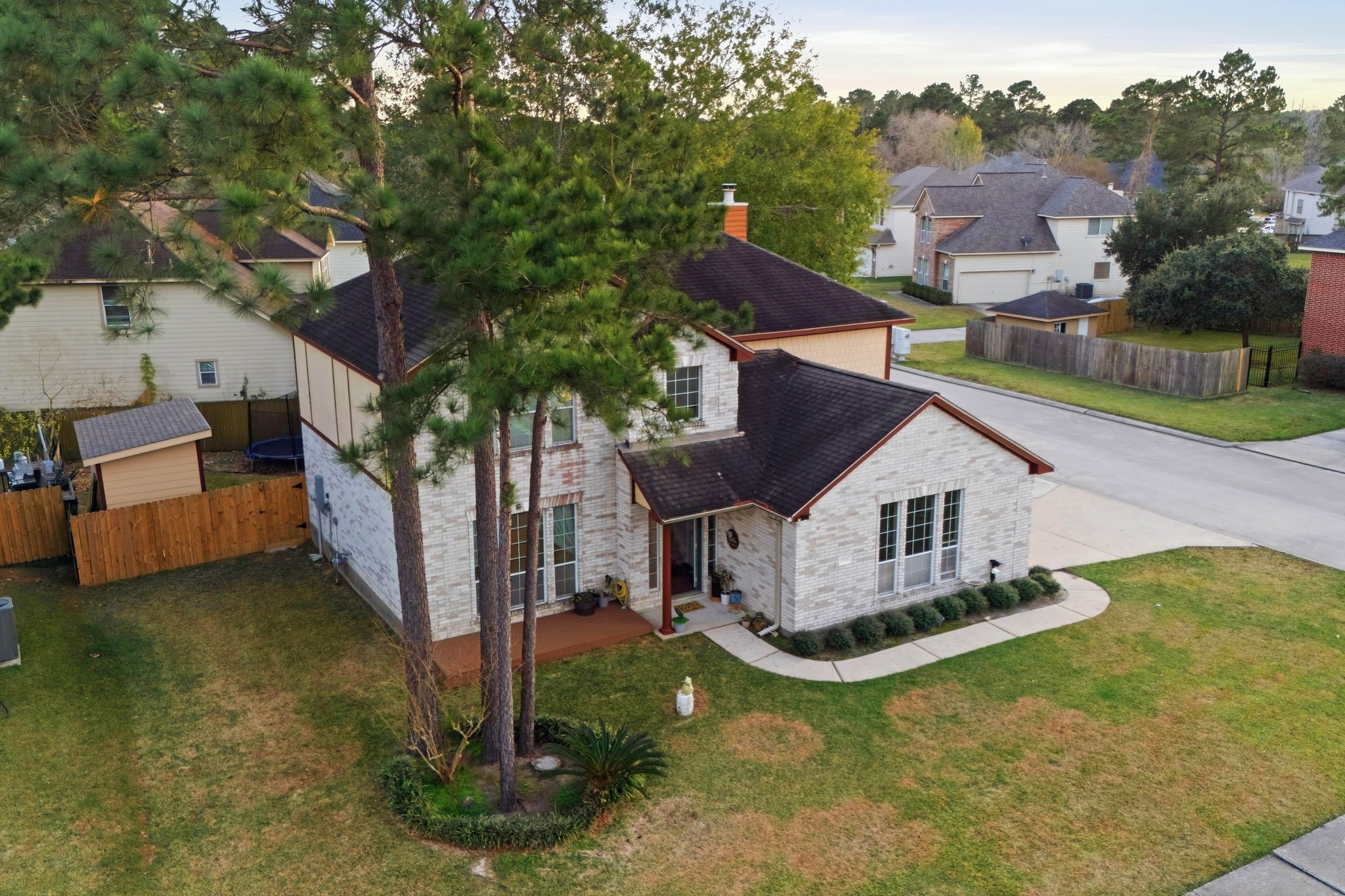 1908 Northampton Drive Conroe, TX 77303 - Photo 39 of 44 a view of a house with a yard and sitting area