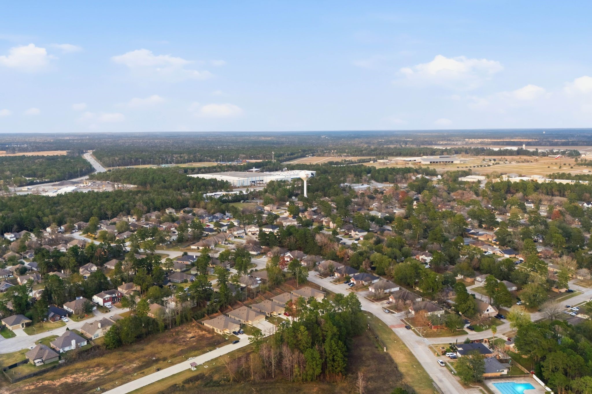 1908 Northampton Drive Conroe, TX 77303 - Photo 43 of 44 an aerial view of residential building and trees
