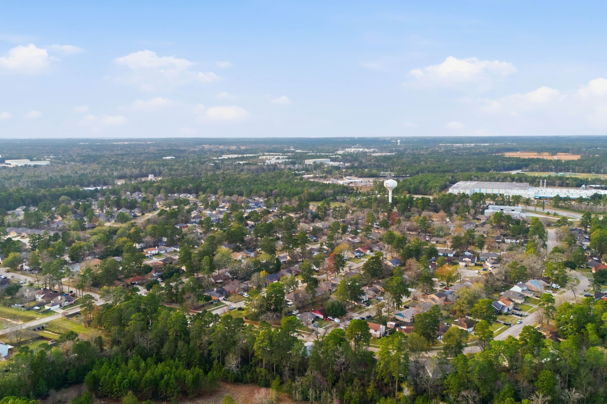 1908 Northampton Drive Conroe, TX 77303 - Photo 44 of 44 an aerial view of residential houses with city view