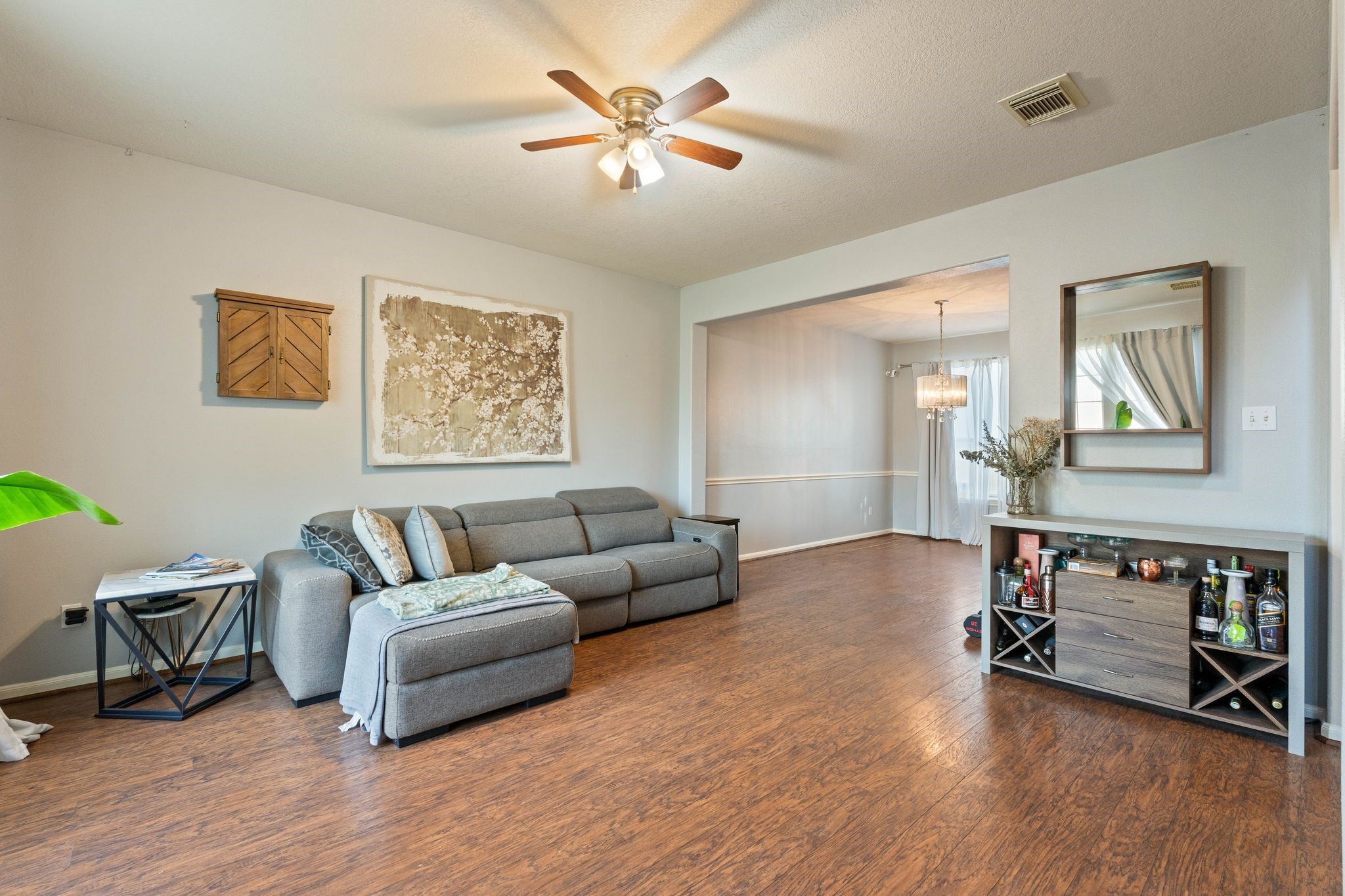 1908 Northampton Drive Conroe, TX 77303 - Photo 5 of 44 a living room with furniture and a wooden floor