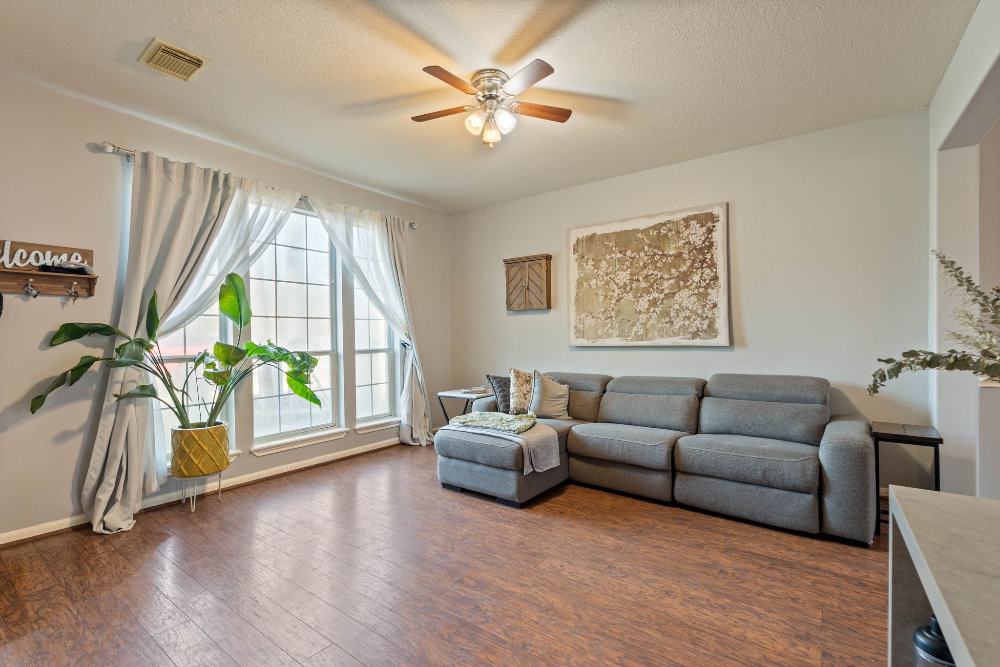1908 Northampton Drive Conroe, TX 77303 - Photo 6 of 44 a living room with furniture and a large window