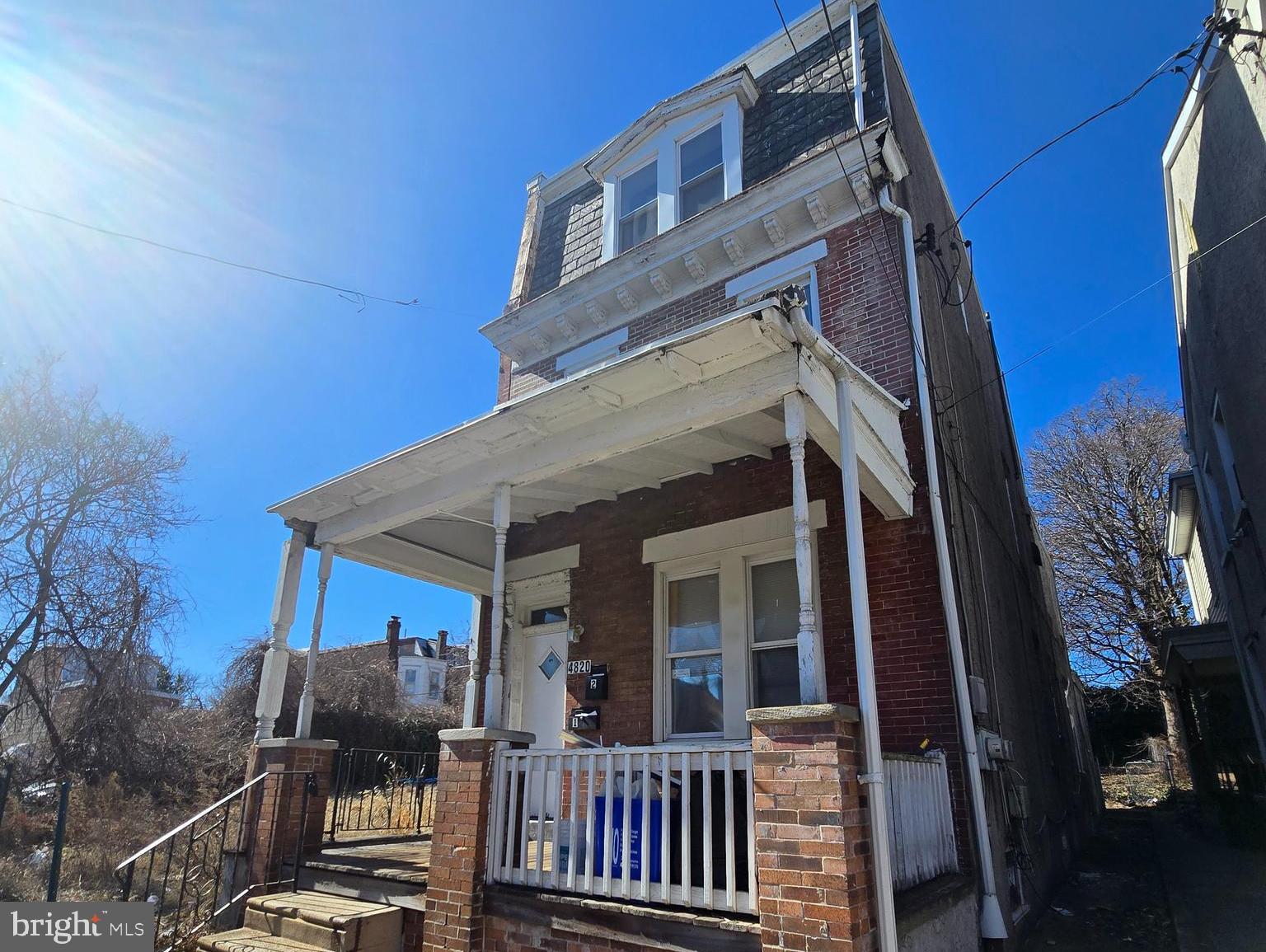4820 Griscom Street, Unit B Philadelphia, PA 19124 - Photo 1 of 17 front view of a house with a small yard