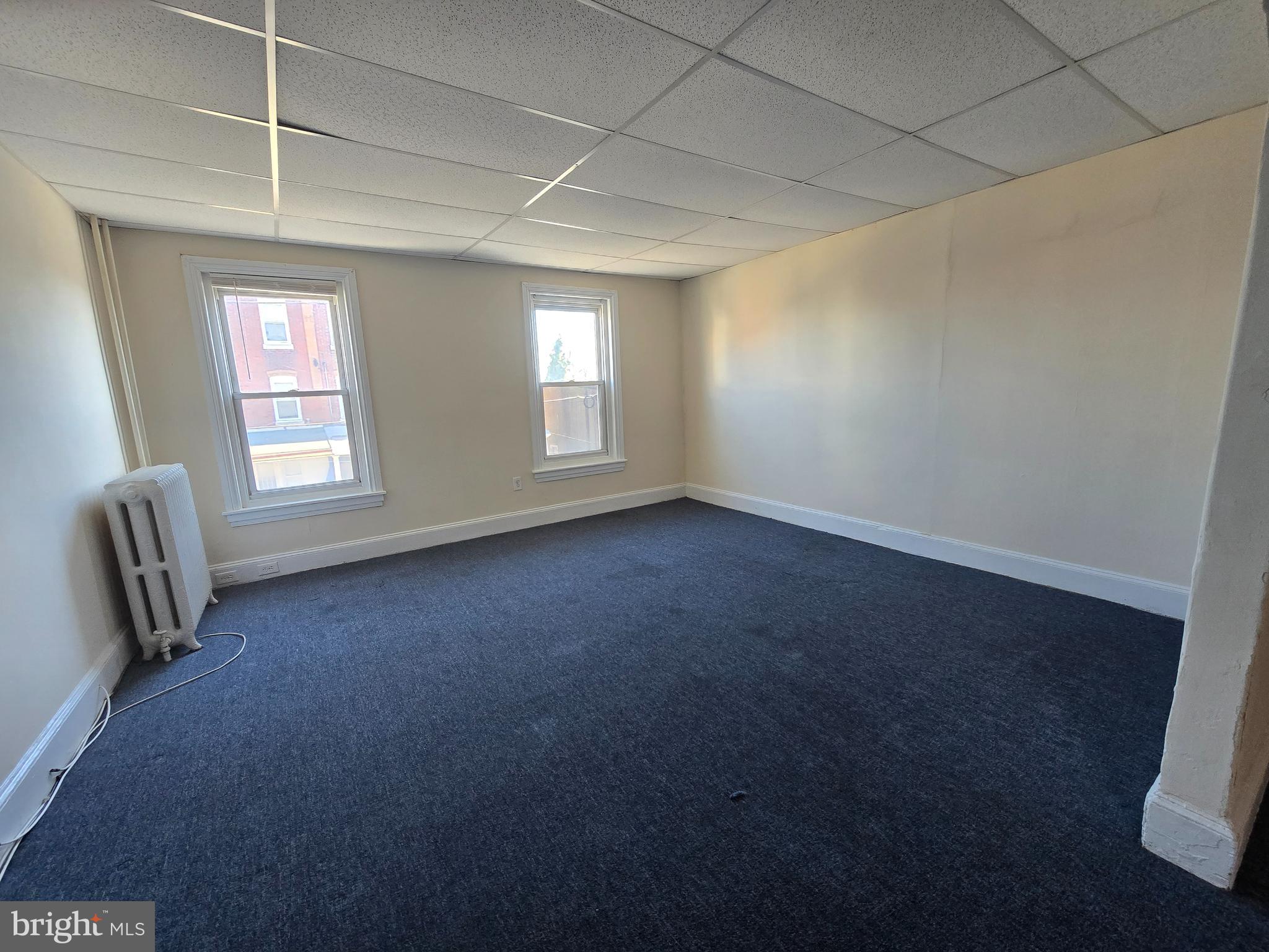 4820 Griscom Street, Unit B Philadelphia, PA 19124 - Photo 10 of 17 an empty room with windows