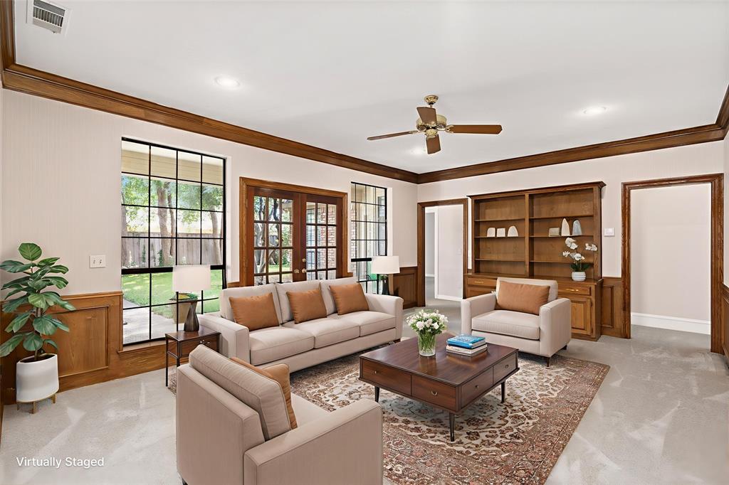 7016 Harvey Lane Plano, TX 75025 - Photo 11 of 26 a living room with furniture and a large window