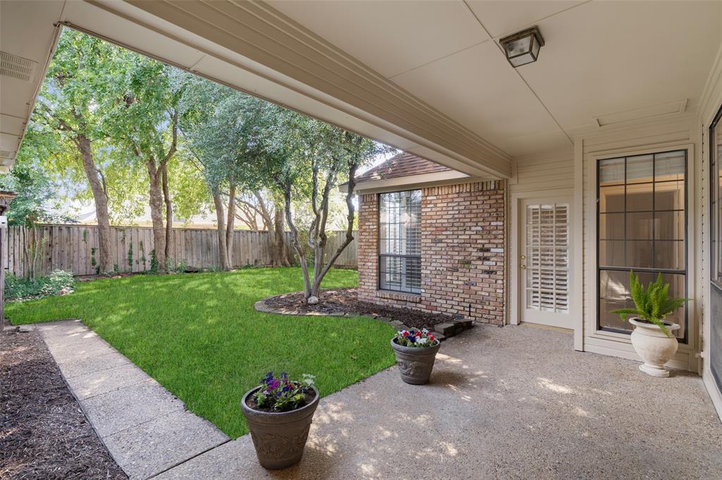 7016 Harvey Lane Plano, TX 75025 - Photo 22 of 26 a front view of a house with garden
