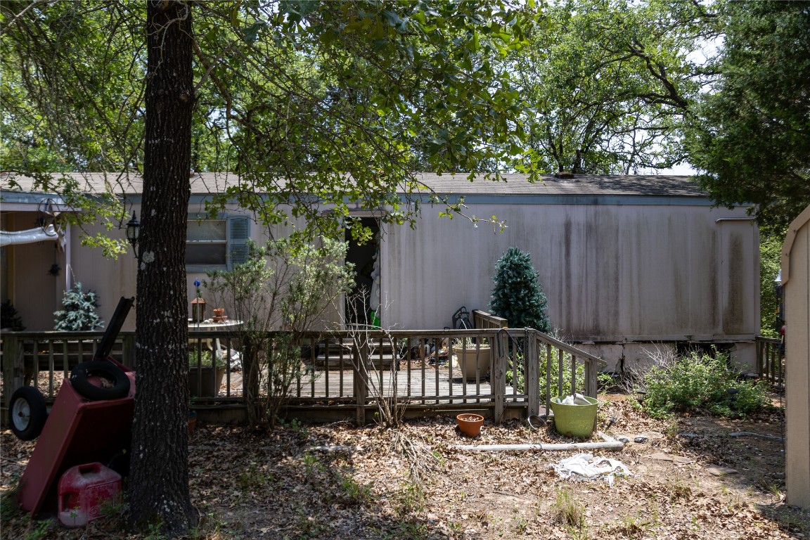 642 Hidden Oaks Drive Elgin, TX 78621 - Photo 15 of 36 a view of a backyard