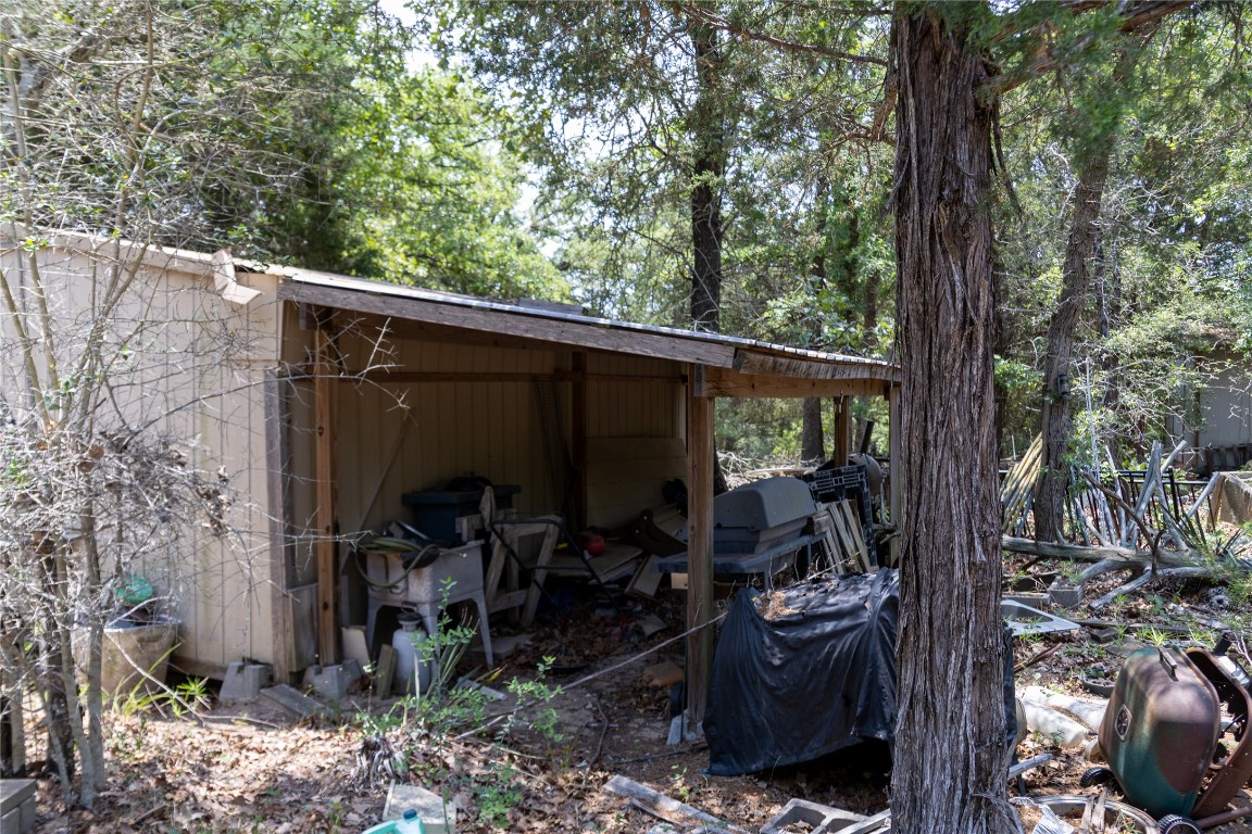 642 Hidden Oaks Drive Elgin, TX 78621 - Photo 16 of 36 a view of outdoor space and deck