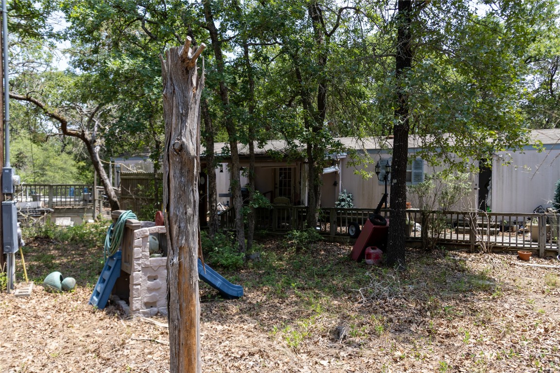 642 Hidden Oaks Drive Elgin, TX 78621 - Photo 19 of 36 a view of a outdoor space and a park