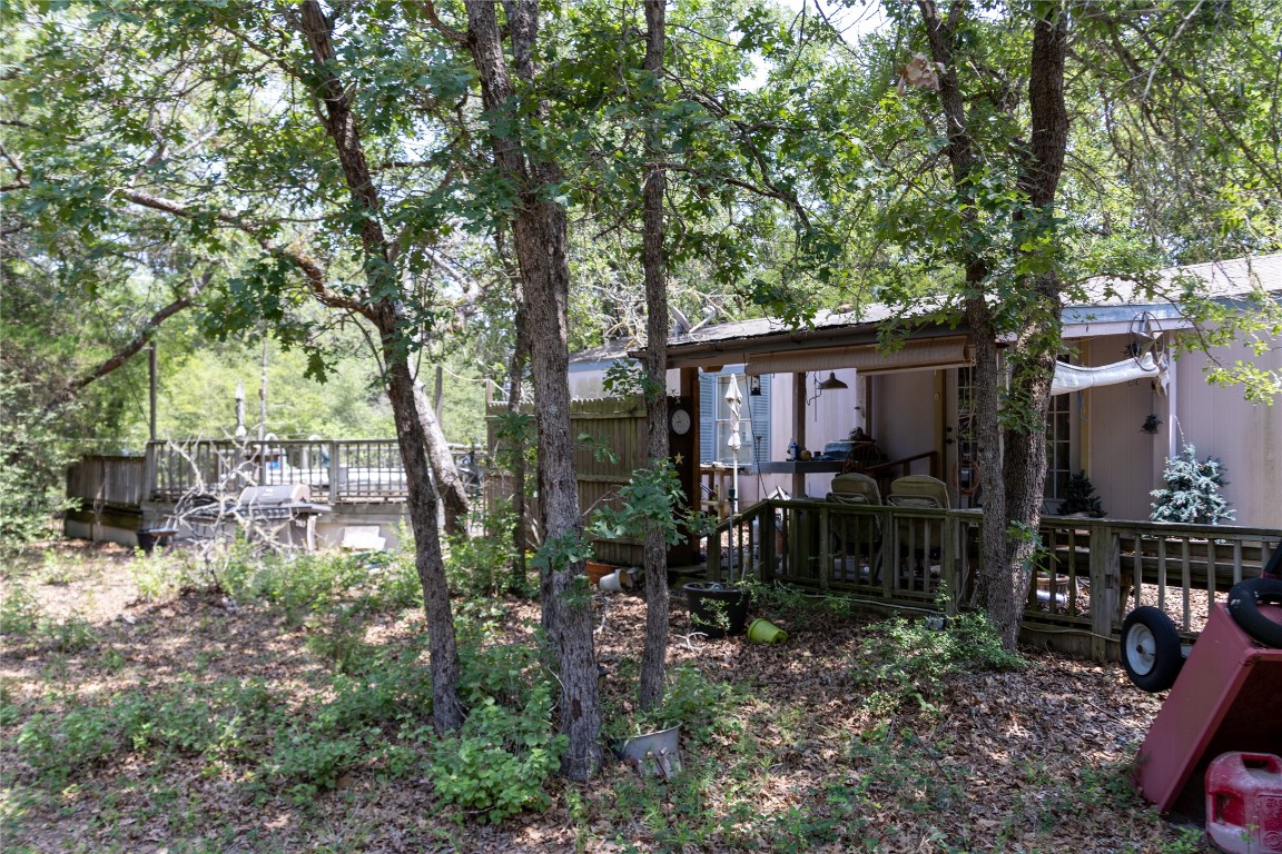 642 Hidden Oaks Drive Elgin, TX 78621 - Photo 3 of 36 a view of house with a outdoor seating