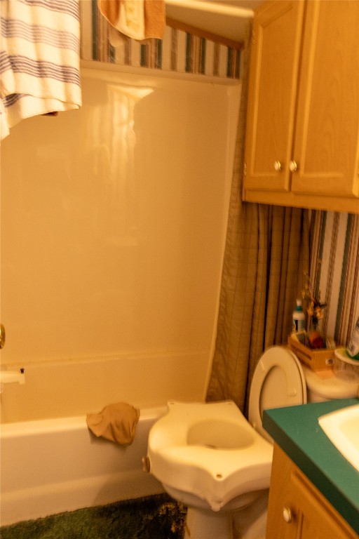 642 Hidden Oaks Drive Elgin, TX 78621 - Photo 33 of 36 a bathroom with a sink and a toilet