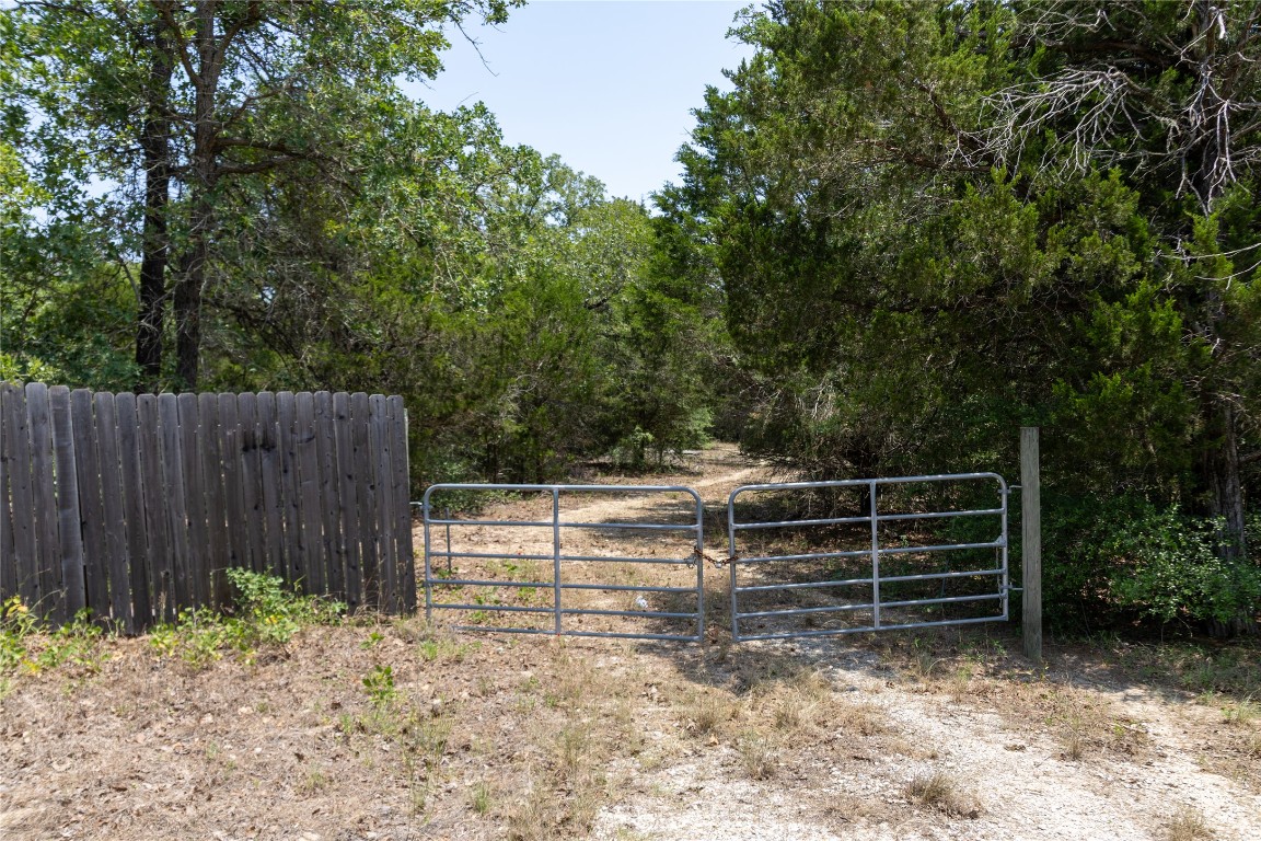 642 Hidden Oaks Drive Elgin, TX 78621 - Photo 9 of 36 a view of backyard with green space